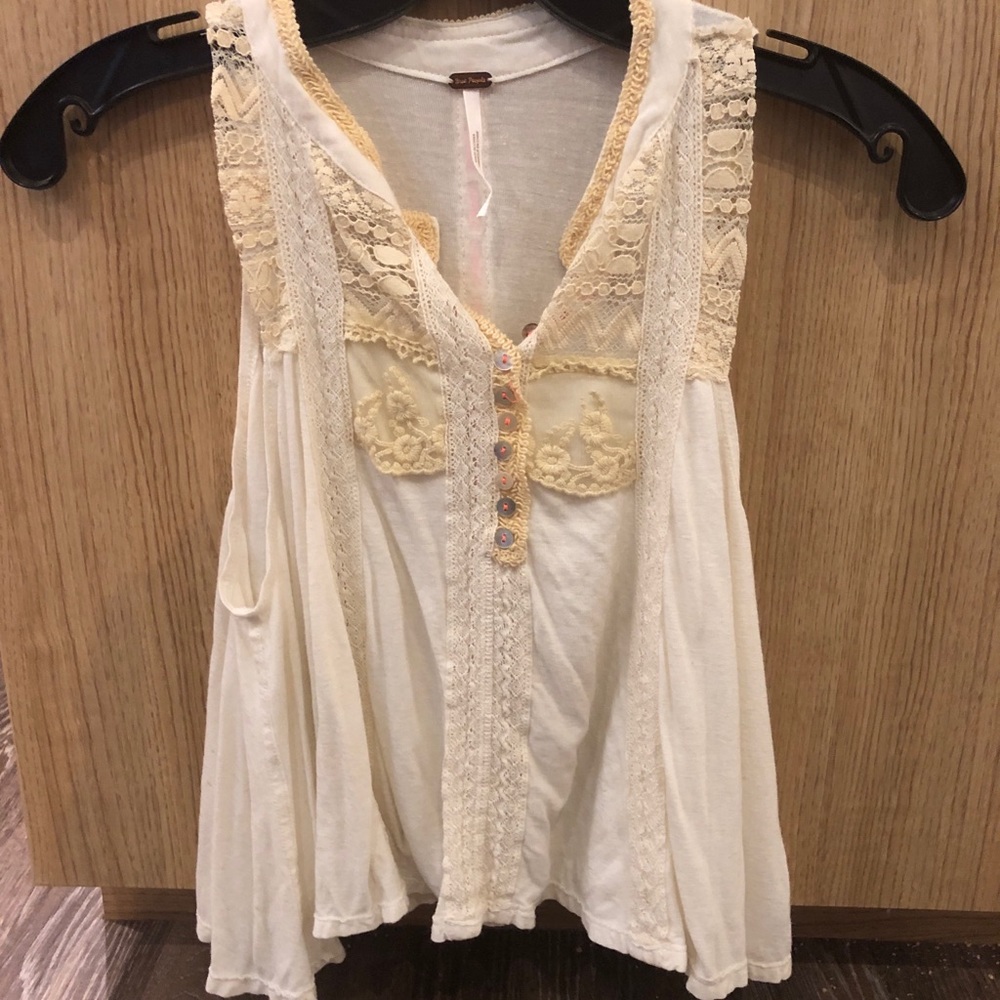 Never worn Free People cream tank top